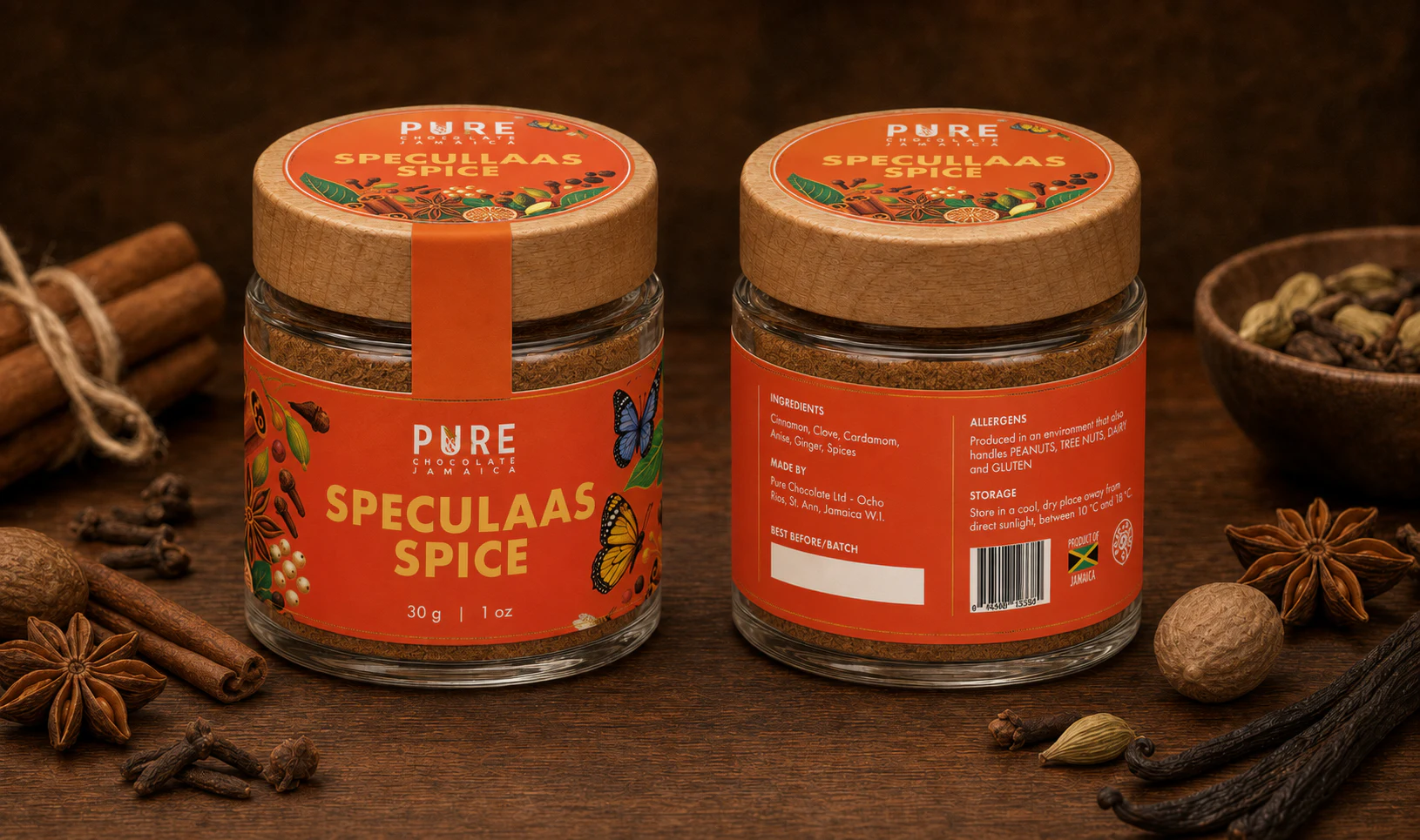 Final Speculaas Spice jars front and back — wooden-lidded glass jars with vivid orange botanical wraps and lid seals.