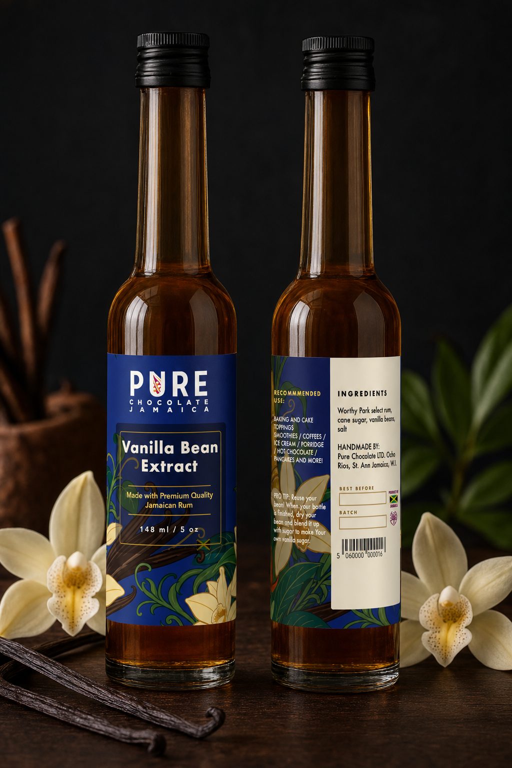 Vanilla Bean Extract bottles front and back — slender rum bottles with a royal-blue painted label of orchids and vanilla pods, vanilla flowers at their feet.